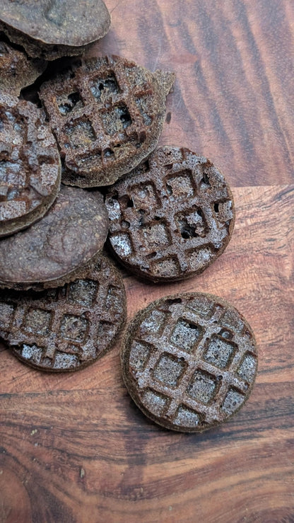 Pets Paradise Love triple berry waffle dog treats with glucosamine on a wooden surface
